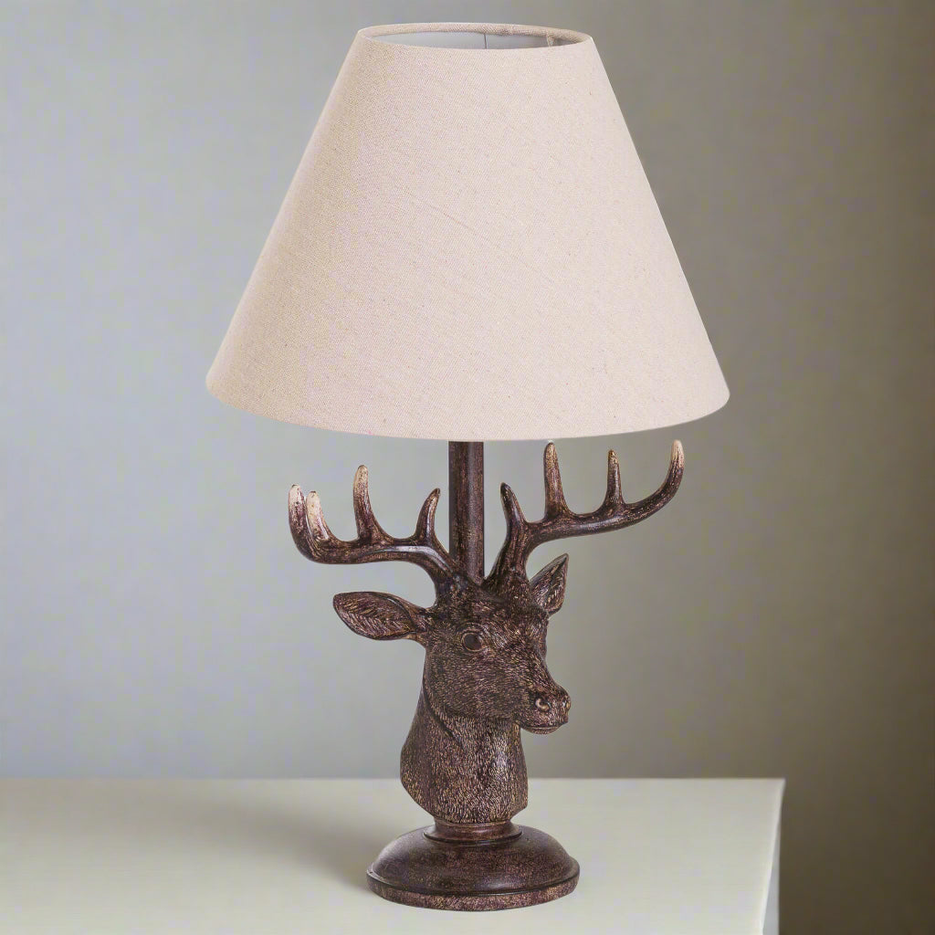 Handcrafted stag head table lamp with antique bronze resin base and natural linen shade, rustic home decor  by Sostter at brixbailey.com
