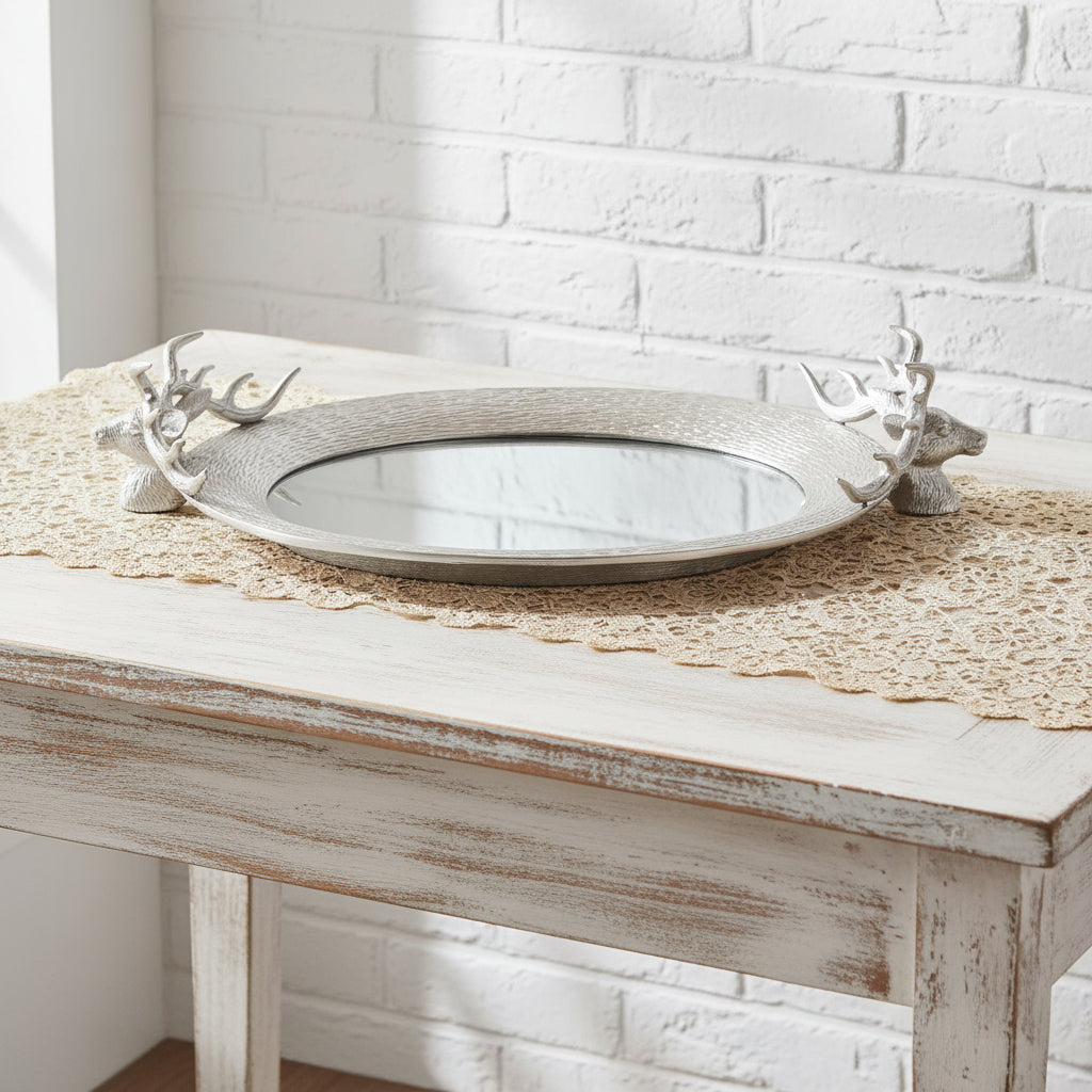 Handcrafted silver stag head mirror tray with ornate handles for coffee table or vanity decor. by sostter at brixbailey.com