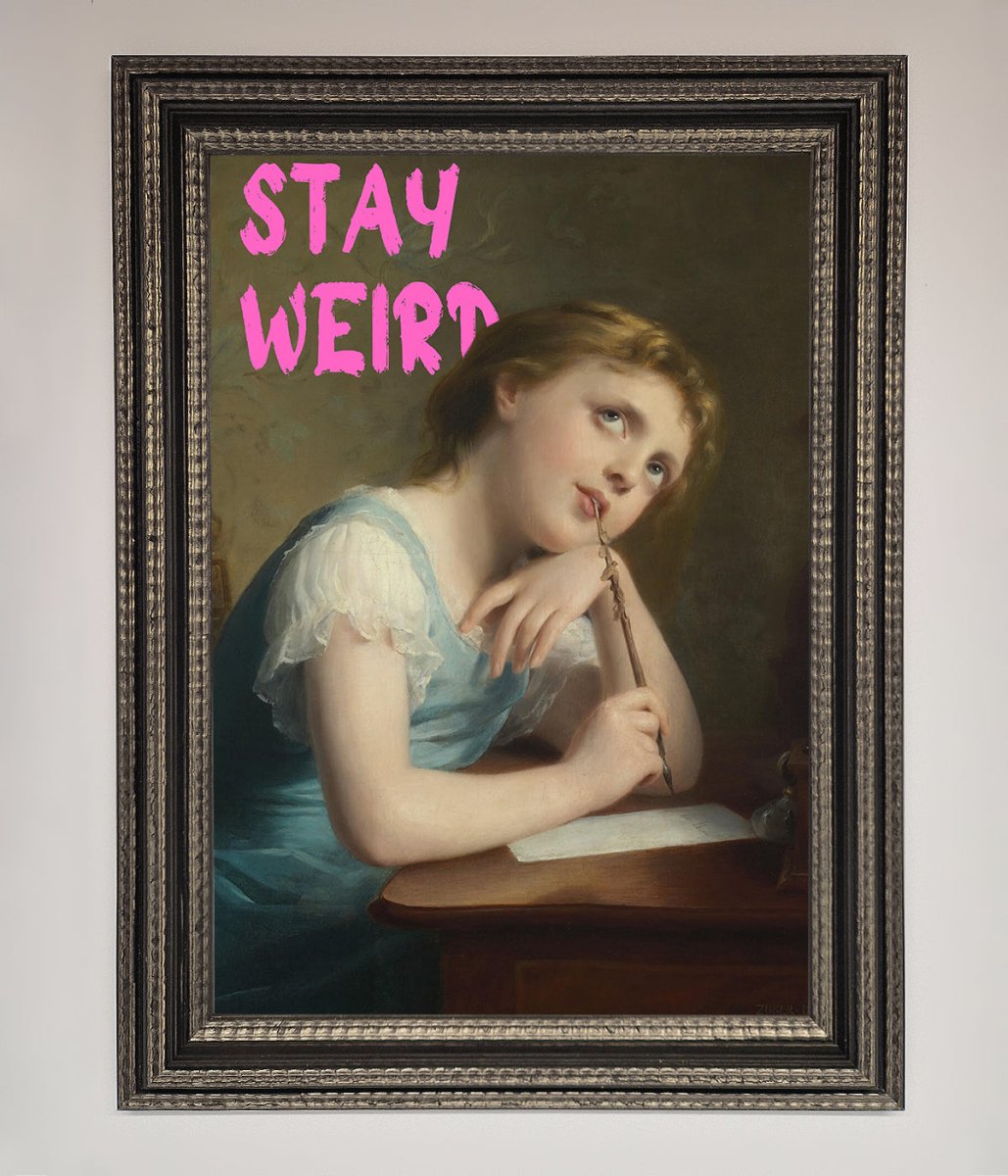 Stay Weird Framed Print