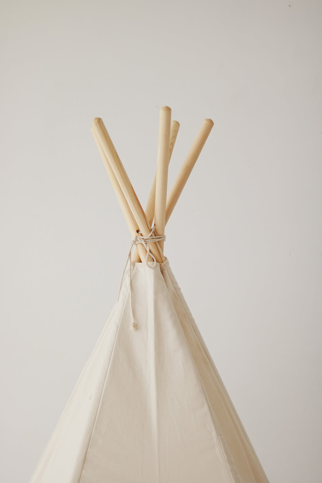a functional kids cotton teepee tent with sturdy pine poles and a storage cover