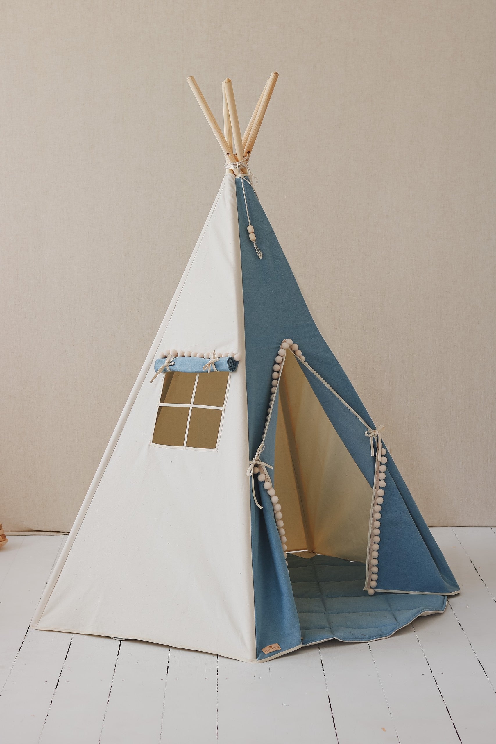 soft denim teepee tent with playful pompoms, cozy hideaway for little explorers to dream and play