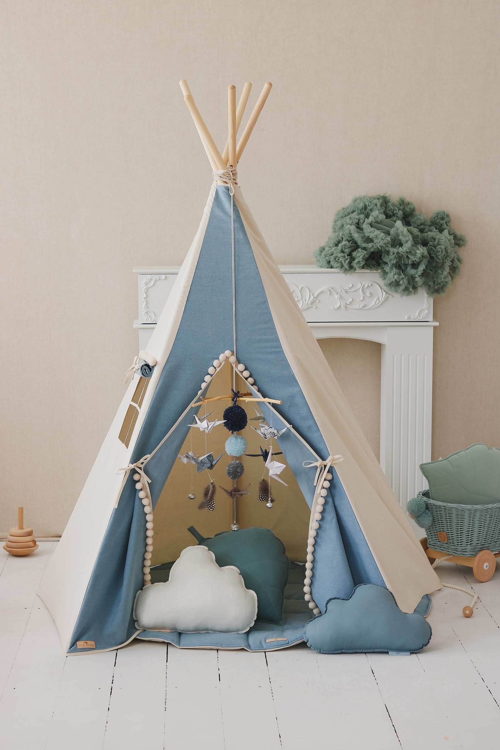 bold denim teepee tent with playful pompoms, perfect for kids' adventures and cozy hideouts