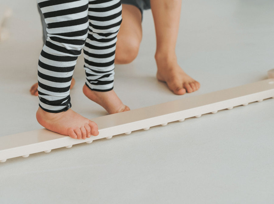 Elevate Playtime with the TipiToo Balance Beam - Fun, Developmental & Versatile for All Ages by Ette Tete at www.brixbailey.com