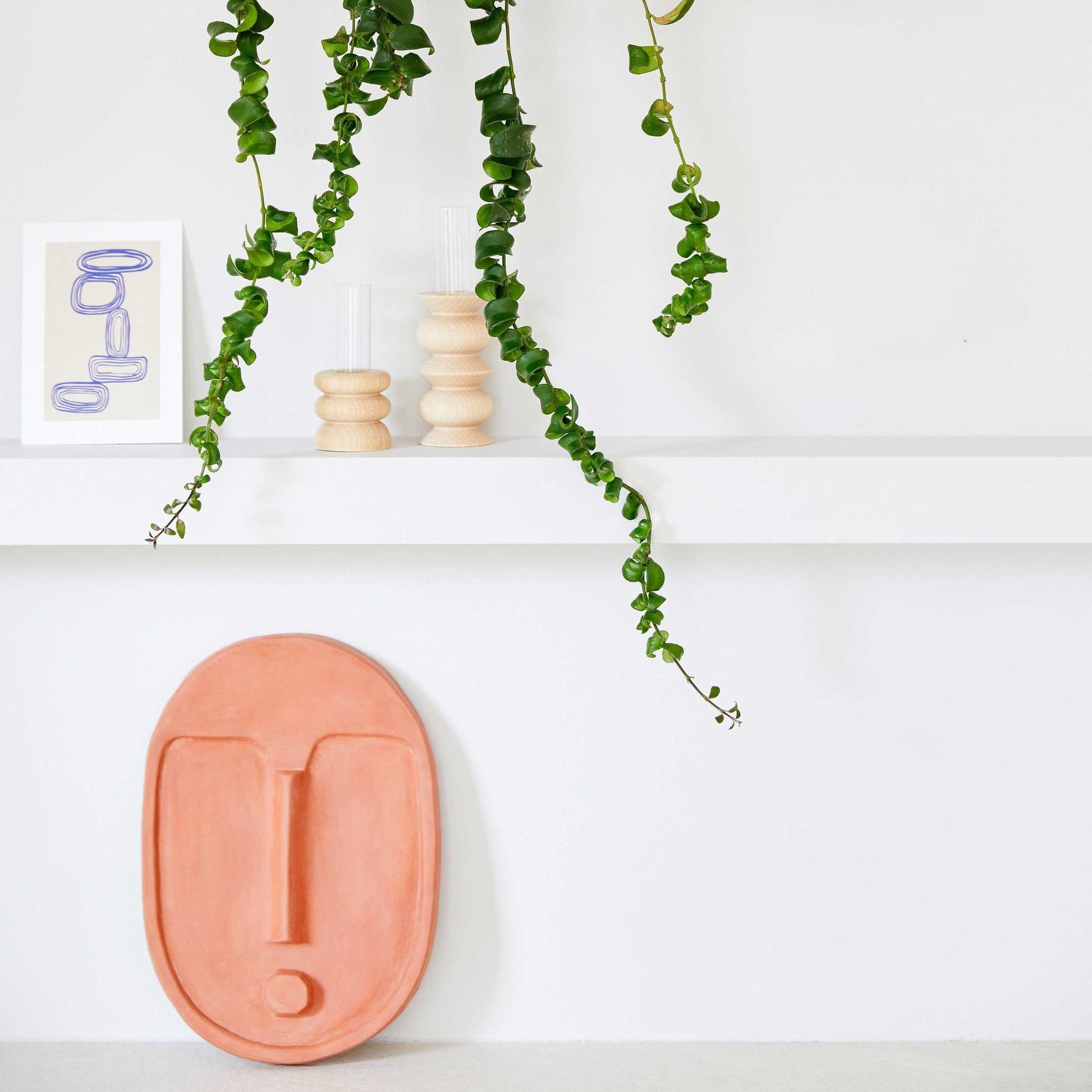 elegant short n1 totem wooden vase with glass tube on a minimalist table