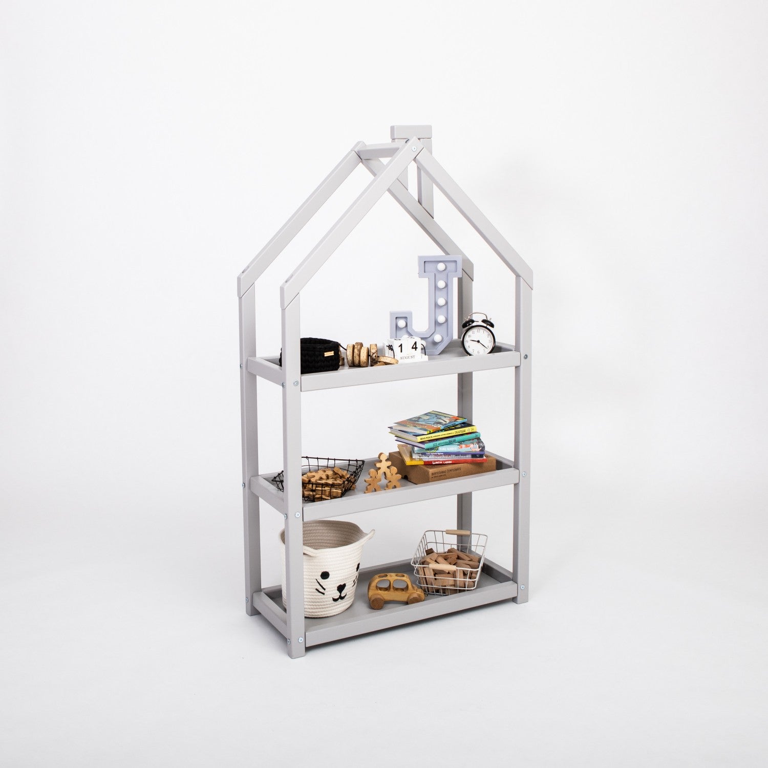 playful grey house-shaped kids shelf with toys displayed in a sunny nursery corner