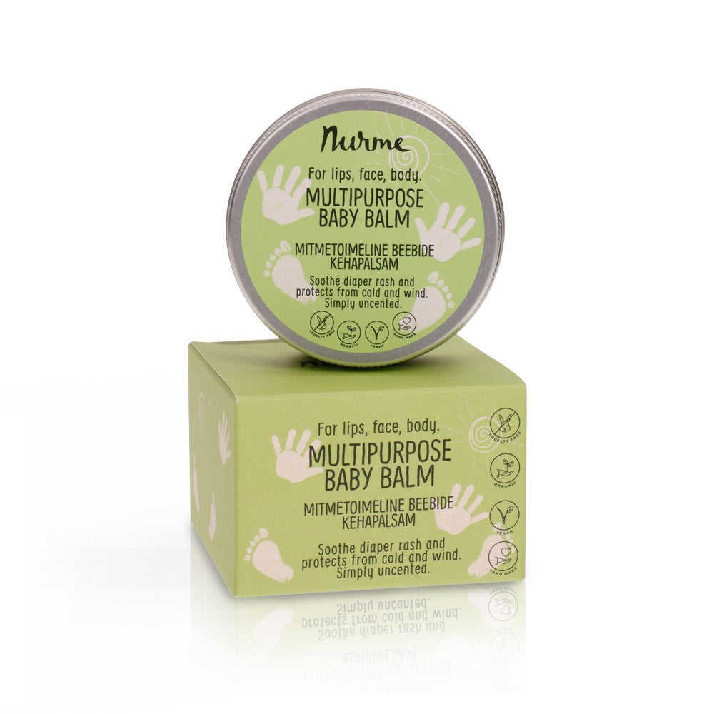 a bold close-up of organic multipurpose baby balm jar with rich shea butter texture