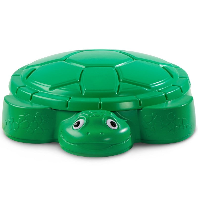 elegant green turtle sandbox with shell lid open, showcasing smooth seats and spacious sand area in golden sunlight