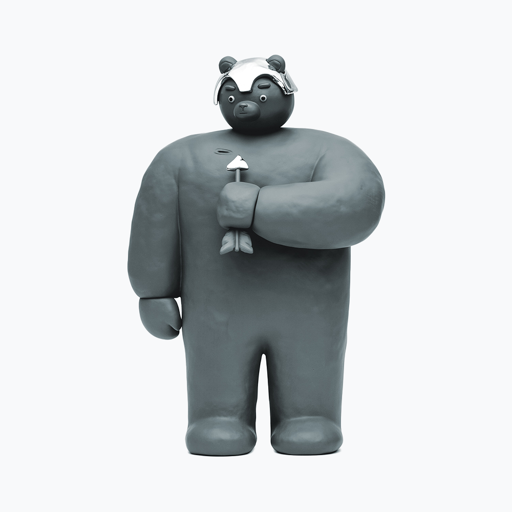 A Bear With An Arrow Sculpture