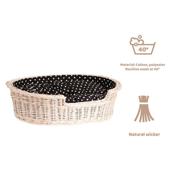 a cozy whitewashed wicker dog bed with a soft cushion in a stylish nursery setting