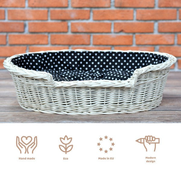 elegant whitewashed wicker dog bed in a bright nursery setting with soft morning light