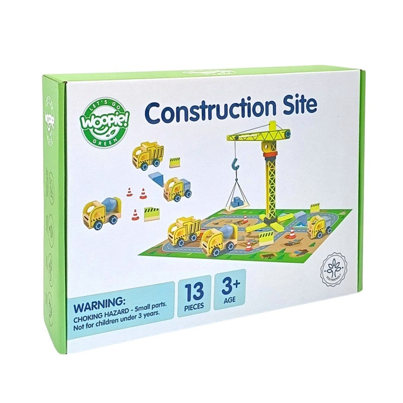 a child's hands assembling the woopie green wooden crane, showcasing its functional design and smooth wooden pieces
