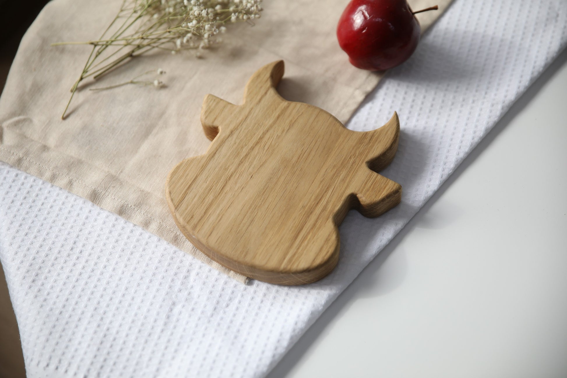 elegant handmade oak wooden plate for kids with bull design, smooth polished surface, natural and safe
