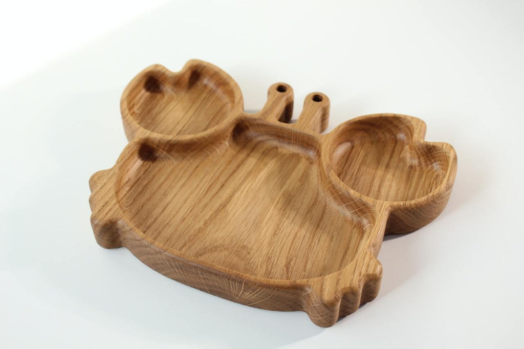 elegant handmade oak kids plate with crab design, smooth polished surface, natural wood grain visible