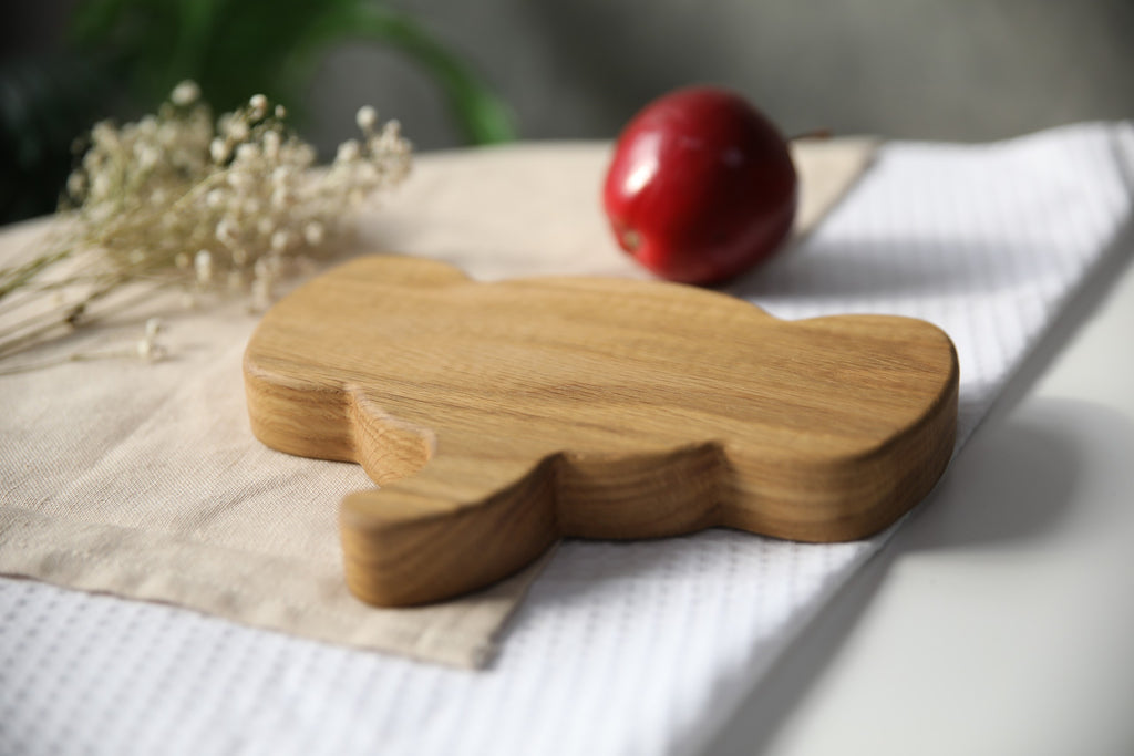 elegant handmade wooden plate for kids with elephant design, smooth oak surface, natural and safe for meals