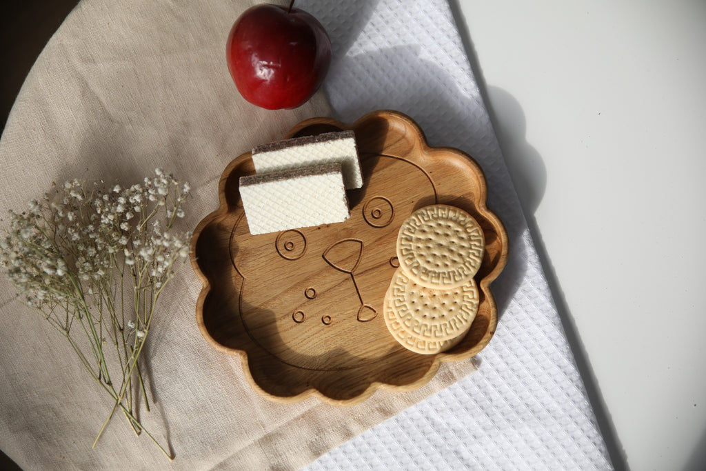 bold lion-engraved wooden kids plate with smooth oak finish, safe and stylish for little hands
