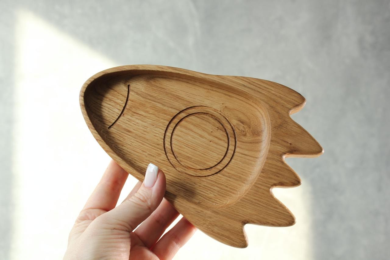 bold rocket-shaped wooden plate for kids, hand-polished oak with smooth finish, eco-friendly baby gift