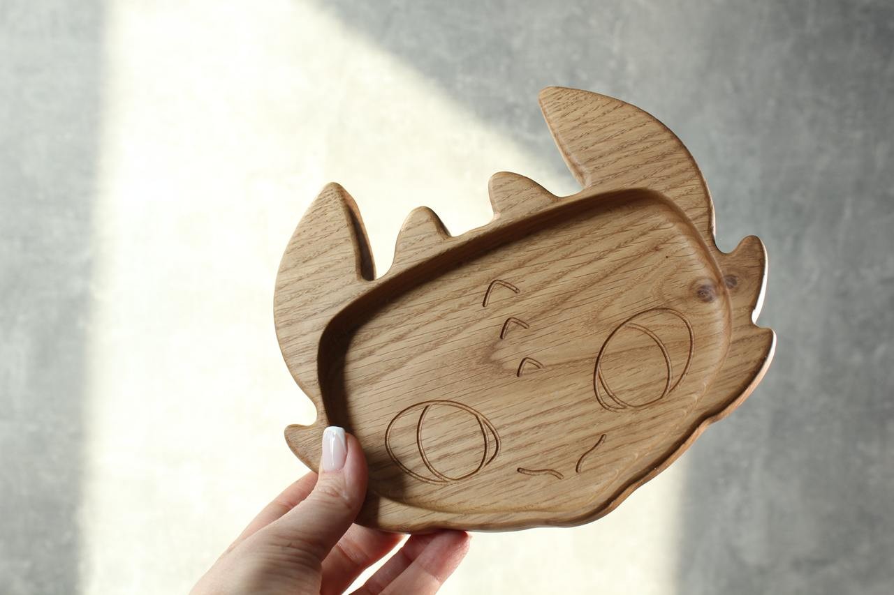 elegant wooden plate for kids with toothless design, hand-polished oak surface, natural and safe for meals