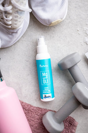 gentle morning light on a bottle of pure zechstein magnesium oil spray