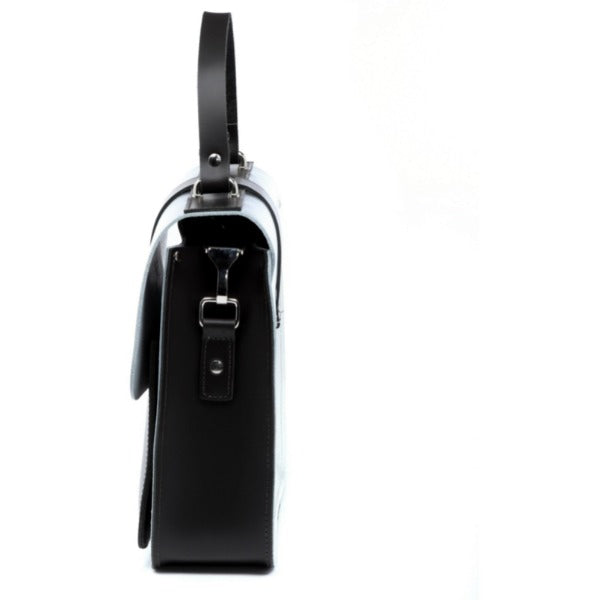 elegant silver leather top handle bag with a rich chocolate calf hair base, shown in a refined close-up