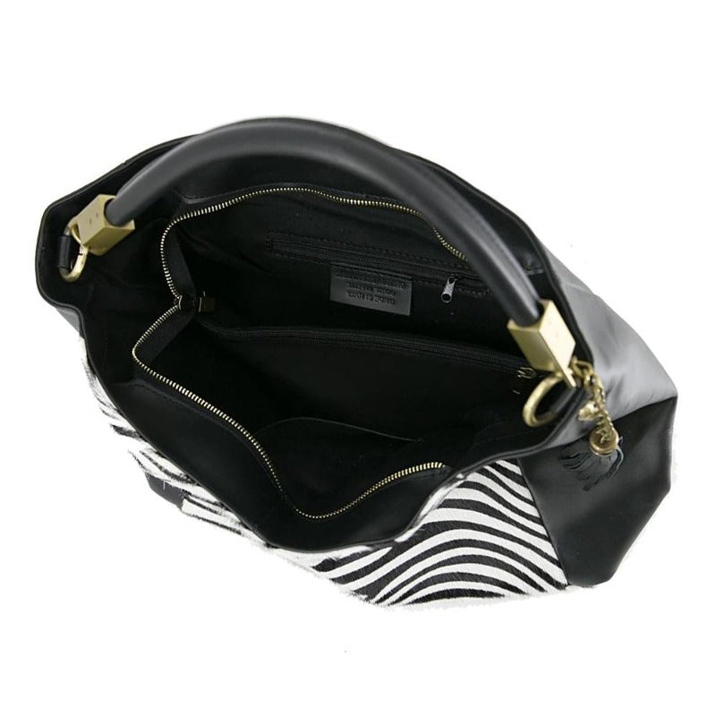 Zebra Print Leather Grab Bag – Luxurious & Versatile Style by Sostter at brixbailey.com