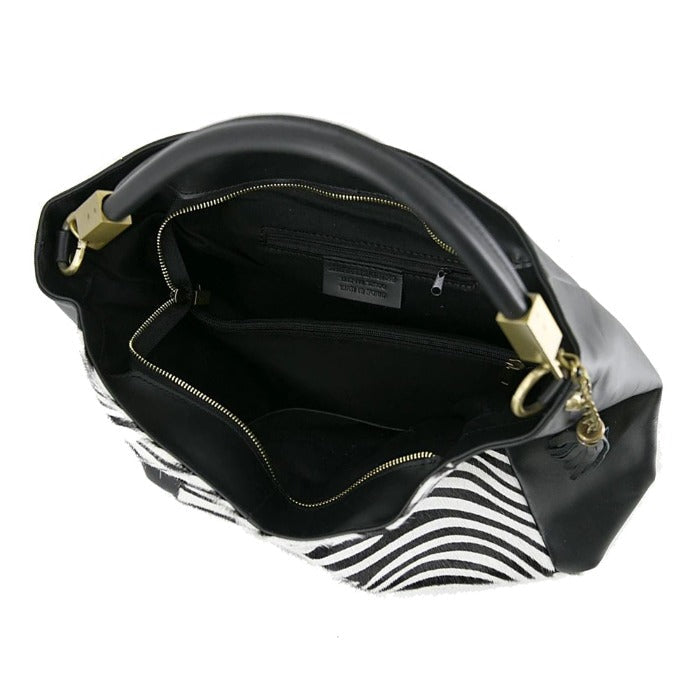 Zebra Print Calf Hair Leather Bag – Elegant & Versatile by Sostter at brixbailey.com